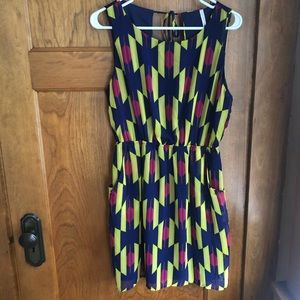 Hello Miss Dress. Large. Multi-colored dress with open back. Has pockets!